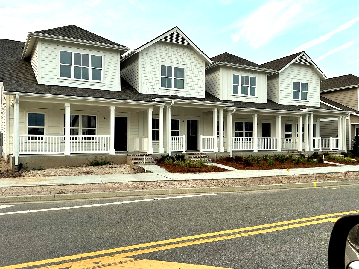 Newly installed exterior windows and entry doors in Goose Creek townhouses, SC