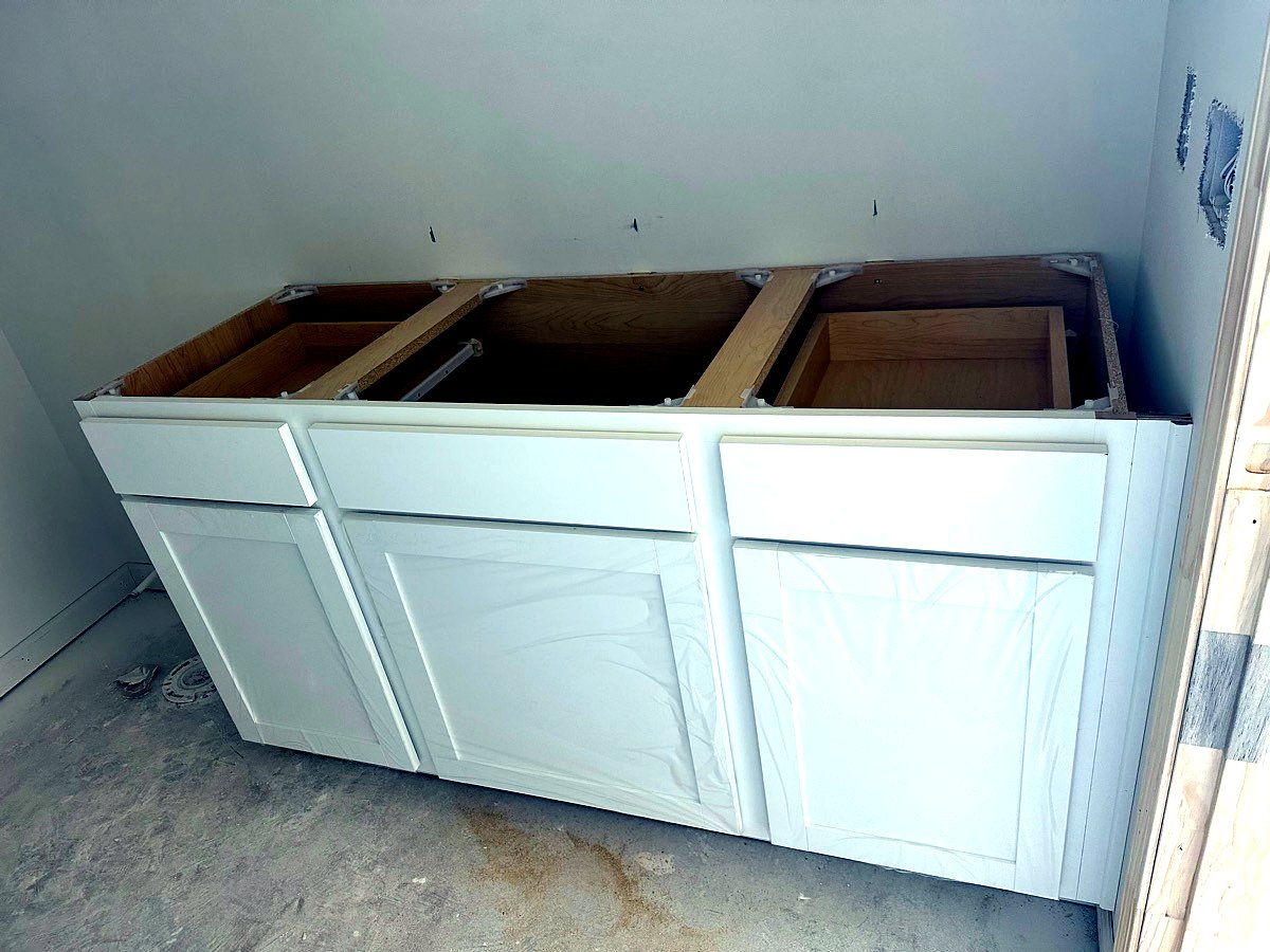 Premium bathroom vanity cabinetry and trim work under construction in South Carolina