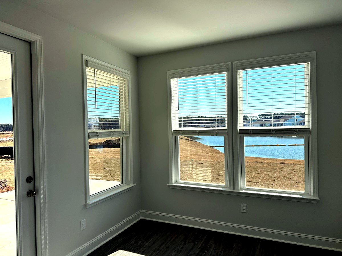 Completed three-pane custom windows with interior trim in Goose Creek, SC